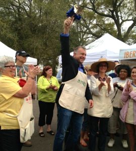Dylan Ratigan rings the "opening bell" for Iberia's new Creole Market 
