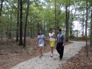 Tipton, Ouachita Well Project Director Pamela Barton and Ouachita Parish Police Juror Pat Moore walk a new walking trail behind Shady Grove Elementary School. The trail was made possible through Challenge Grant funding.