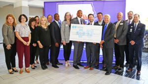 bcbs NSU grant announcement with large check